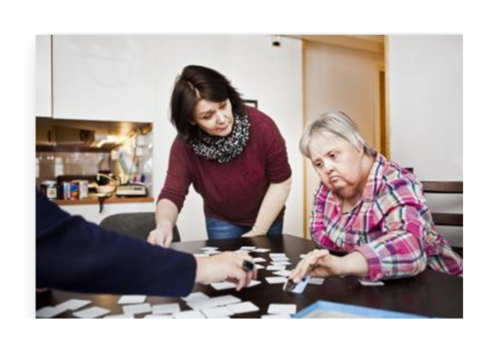 women playing card game